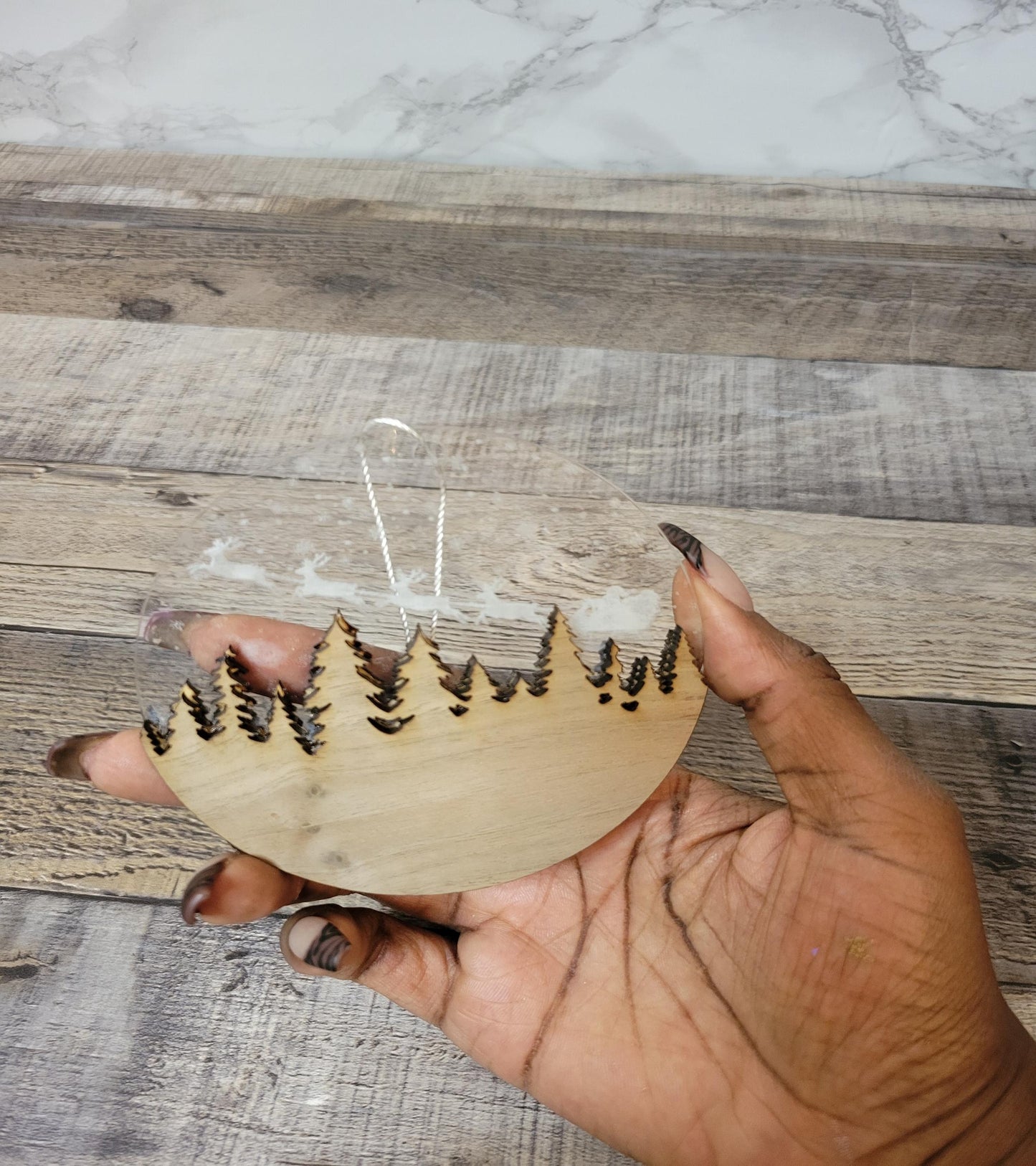 back of wood and clear acrylic ornament