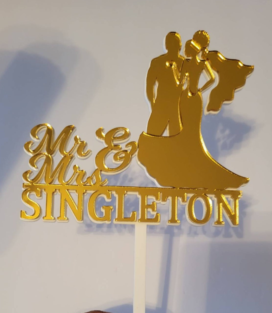 Gold mirror wedding cake topper with silhouette
