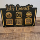 Let's Connect LED Sign with black background, gold lights and gold icons