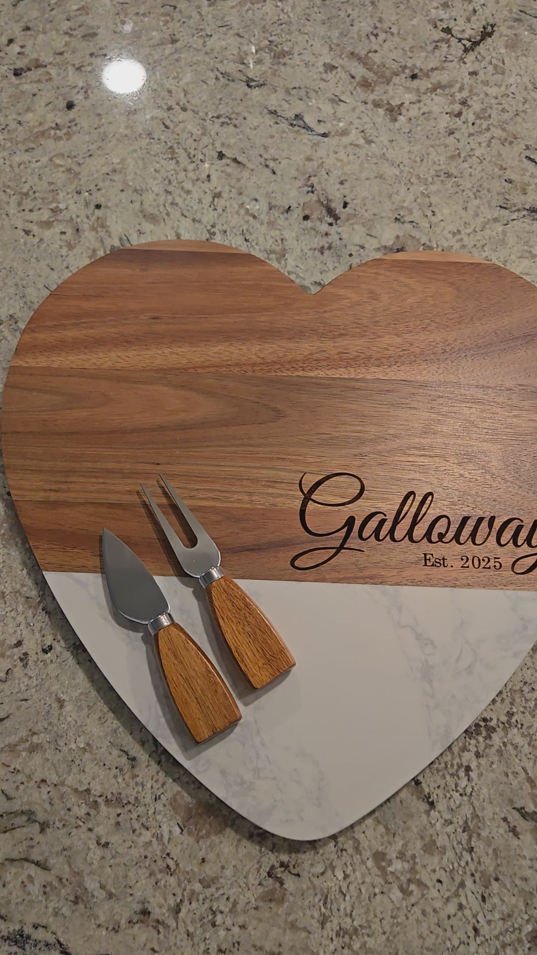Video: Personalized Heart Marble & Acacia Board — wood and white marble heart board engraved 'Est. 2025' with cheese tools