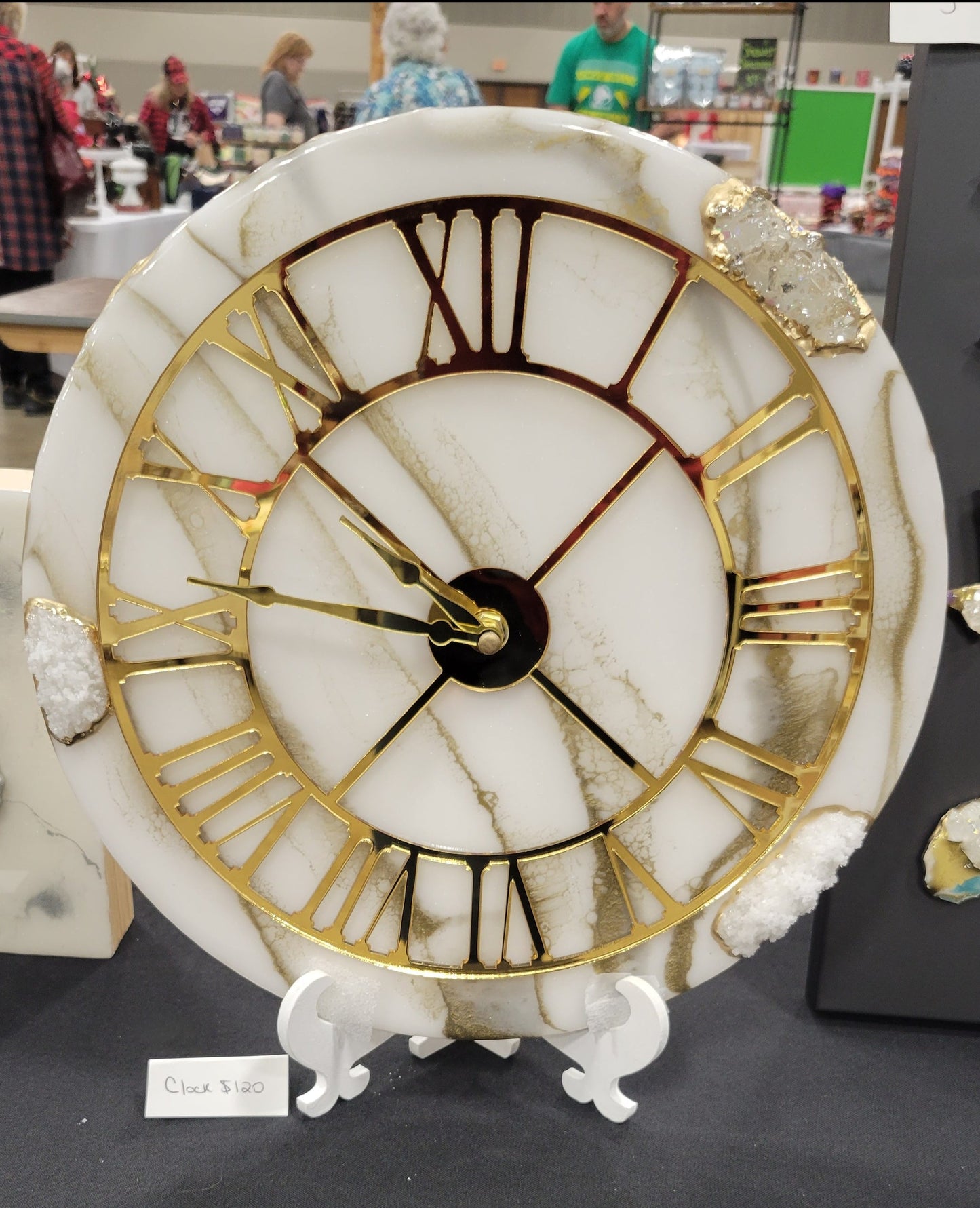 white and gold clock featuring gold mirror clock hands