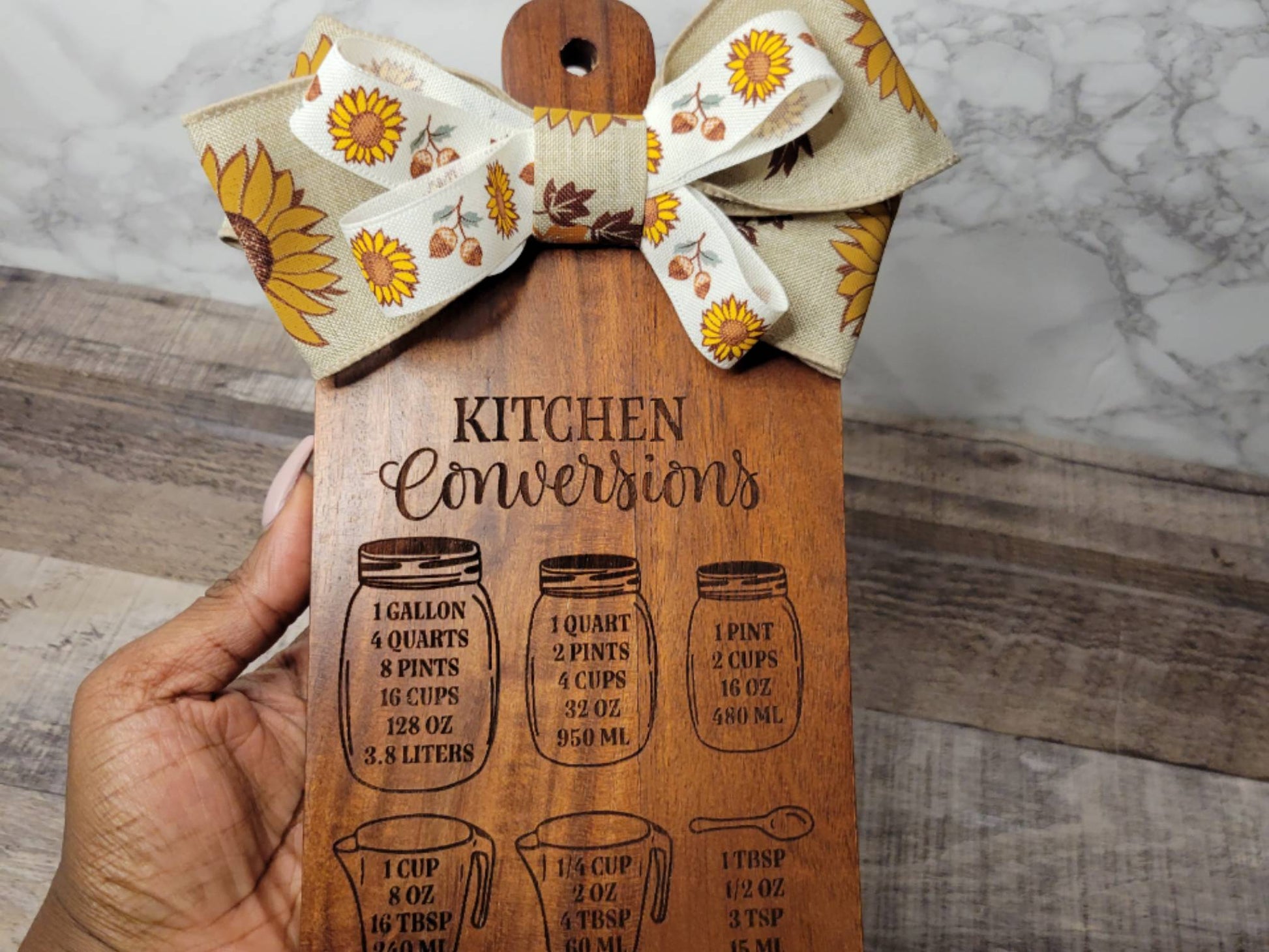 kitchen conversions cutting board/charcuterie board with sunflower ribbon