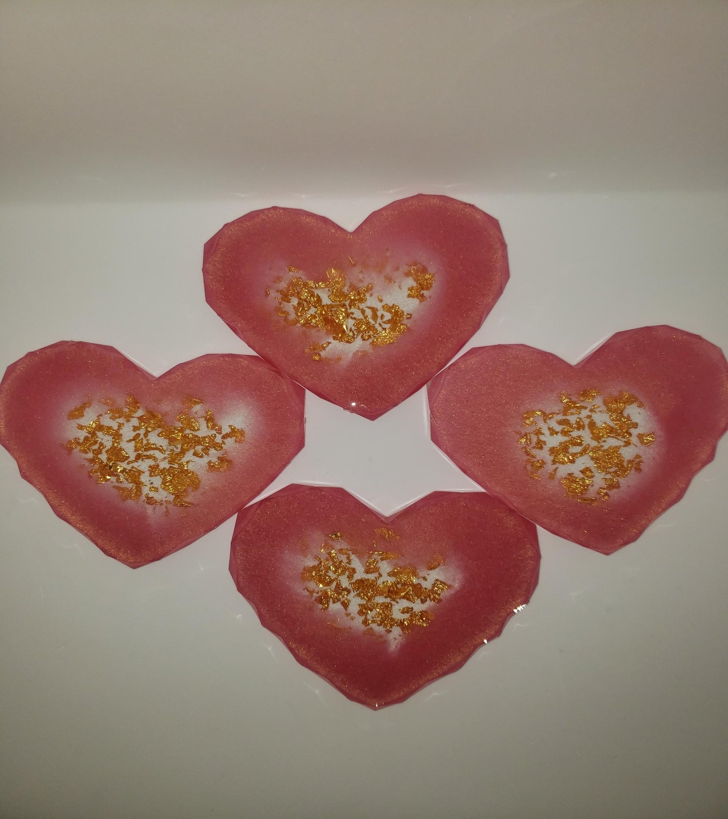 Pink and gold flake resin heart coasters